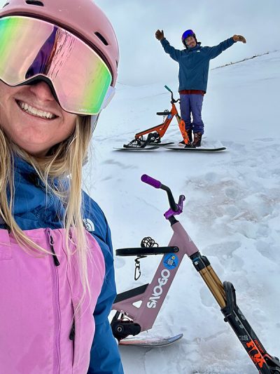 Emma and Garrett on their SNO-GO bikes with some fun happy faces
